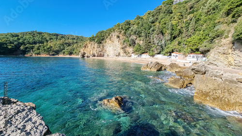 Panoramic view of the Mogren beach in the tourist coastal city of Budva  Montenegro  Adriatic Mediterranean Sea  Montenegro  Balkan  Europe. Coastline of Budvanian riviera. Summer vacation atmosphere