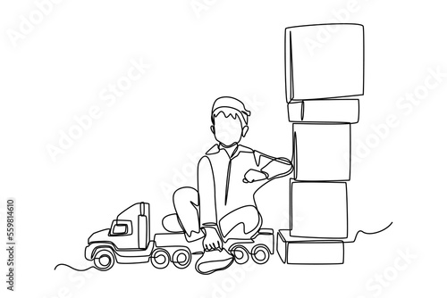 Single one line drawing boy is sitting in a big toy truck with cardboard boxes. Cargo Concept. Continuous line draw design graphic vector illustration.