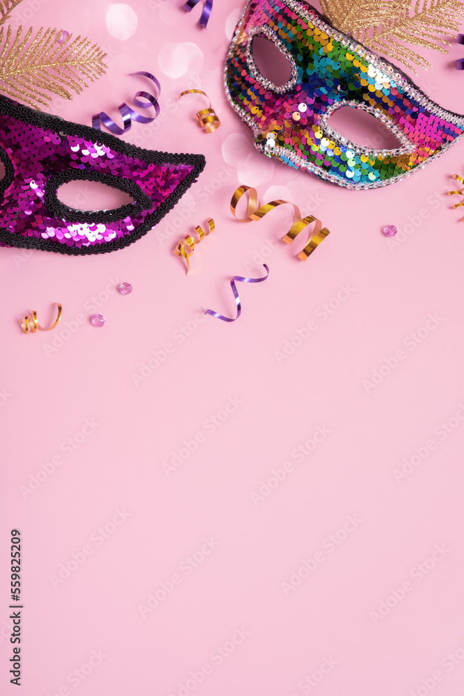 Festive face mask for carnival celebration on colored background. Masquerade vertical background