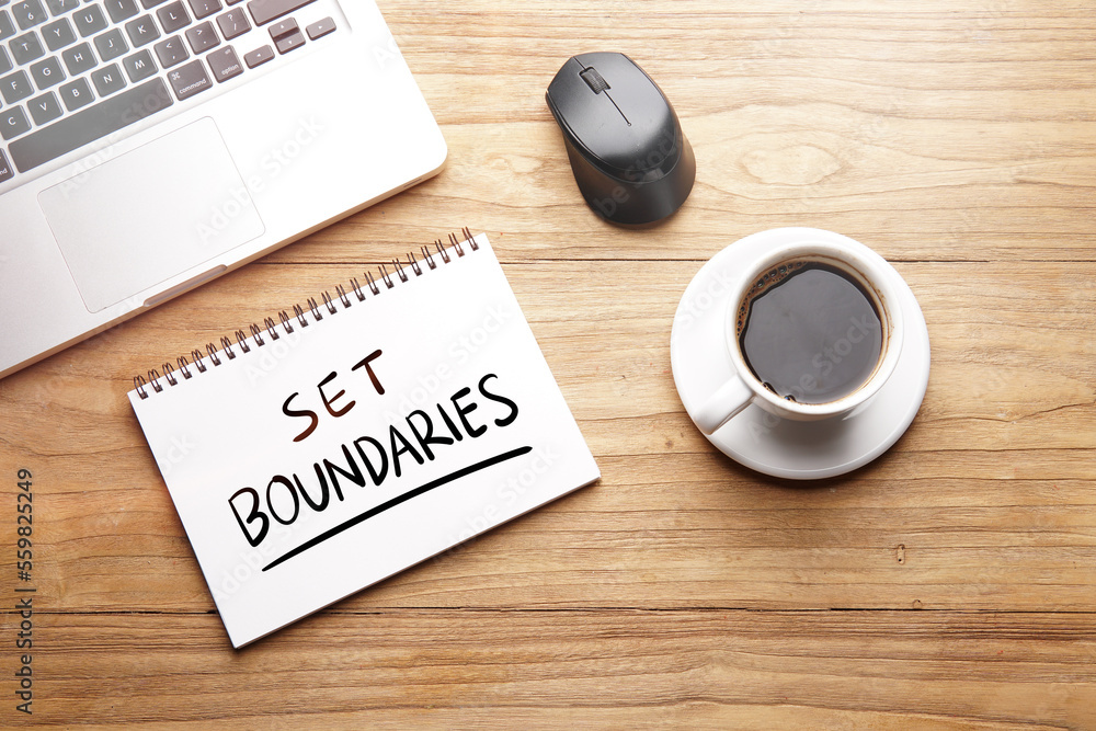 Set Boundaries, motivational words and sentences for work and life. Quote sentence in notebook with laptop, pen, coffee over wooden background. Set Boundaries, motivational words and sentences for work and life. Quote sentence in notebook with laptop, pen, coffee over wooden background.