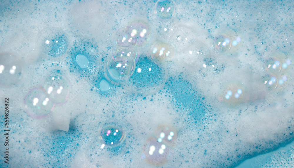 Soap foam on the water on a blue background. Foam texture as background for  image. Soap bubbles on the background of foam Stock Photo | Adobe Stock