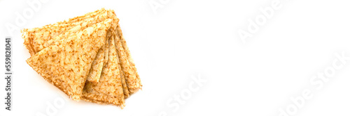 Tableau sur toile Close up on a stack of folded crepes (french pancakes), isolated on white panora