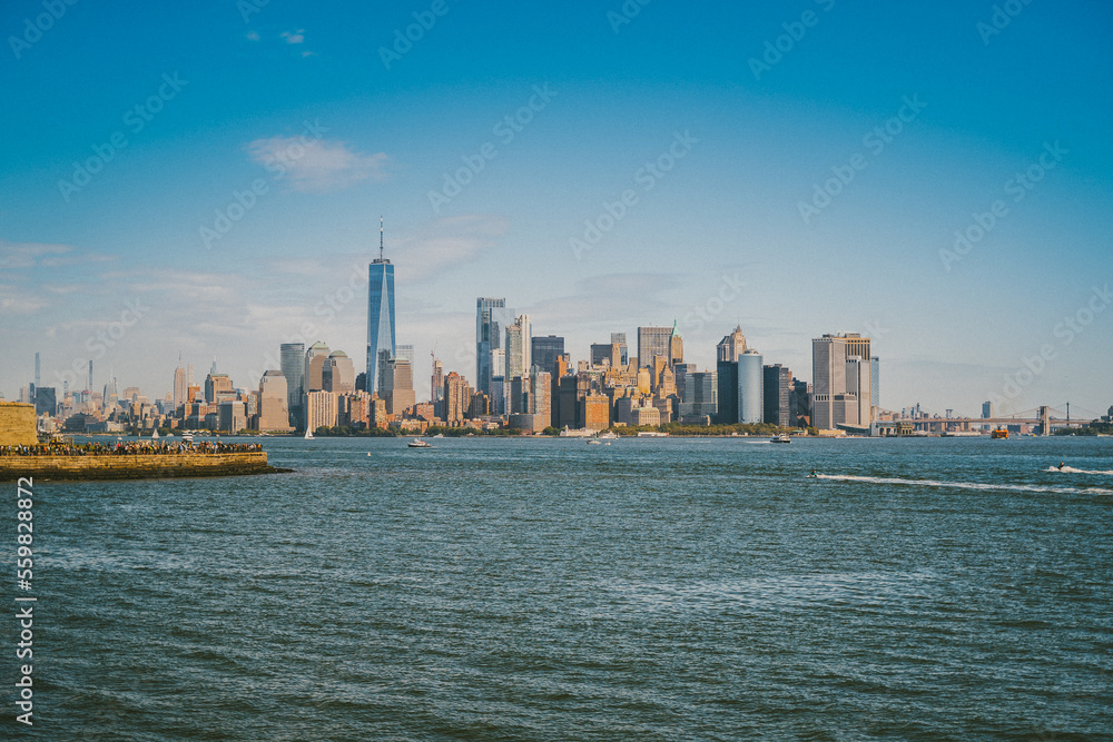 Cityscape with skyscrapers and blue water Cityscape with skyscrapers and blue water
