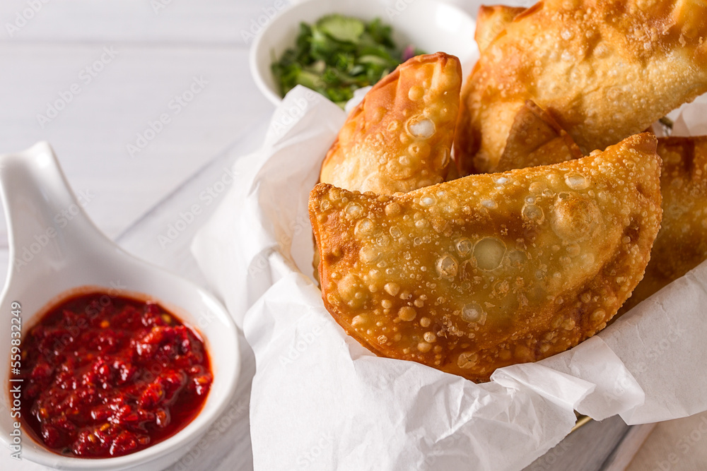 Fried chebureks, close-up, on a white background, no people, Fried chebureks, close-up, on a white background, no people,
