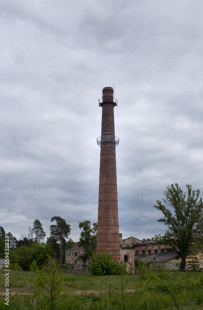Tall brick chimney, old building heating system