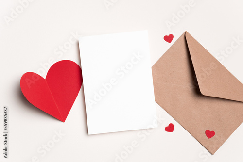 Valentines day card mockup and red heart on paper background