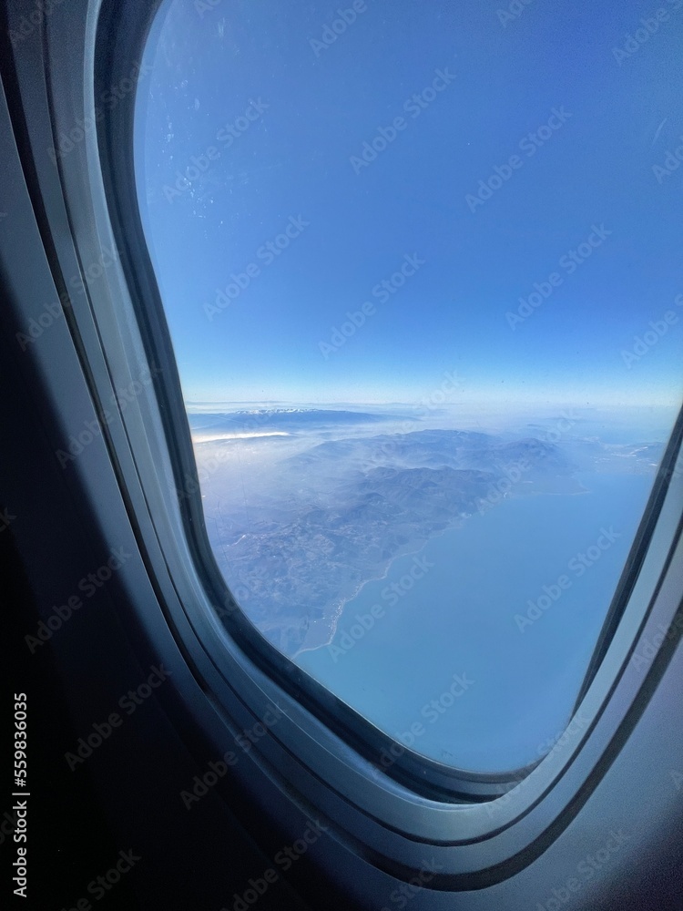 view from window of airplane , view blue sky. view from window of airplane , view blue sky.