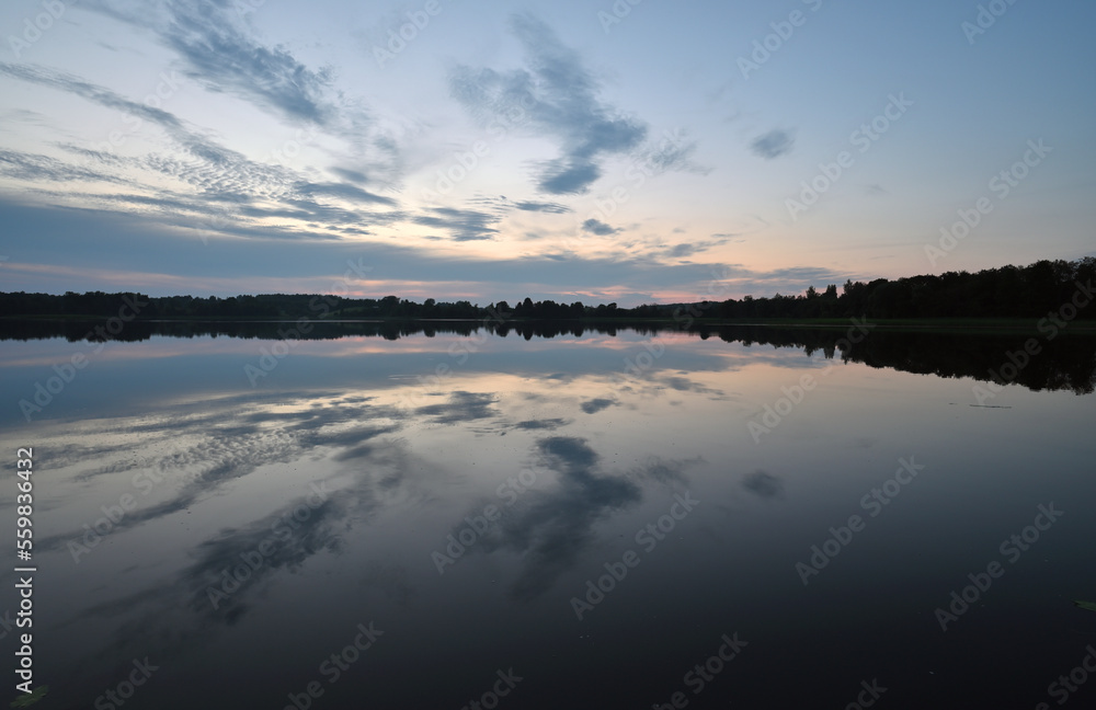Fototapeta premium Colorful sunset over lake in Lithuania