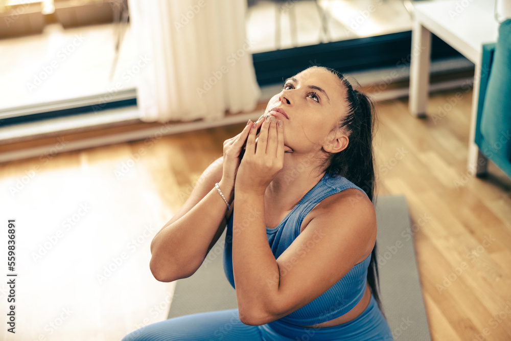 Woman Doing Stretching Exercises At Home Woman Doing Stretching Exercises At Home