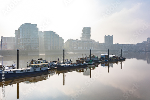 city canal river with the fog and boats view