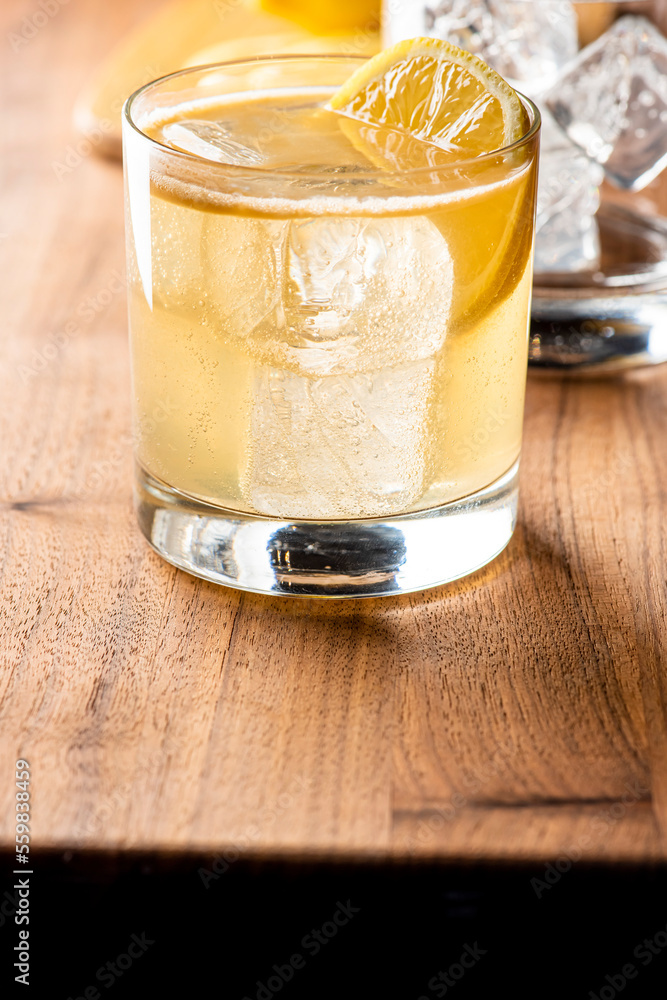 Whiskey sour. Classic Cocktail. Mixed drink with whiskey, lemon juice, sugar, and optionally, a dash of egg white. It is a type of sour, a mixed drink with base spirit, citrus juice, and a sweetener. Whiskey sour. Classic Cocktail. Mixed drink with whiskey, lemon juice, sugar, and optionally, a dash of egg white. It is a type of sour, a mixed drink with base spirit, citrus juice, and a sweetener.