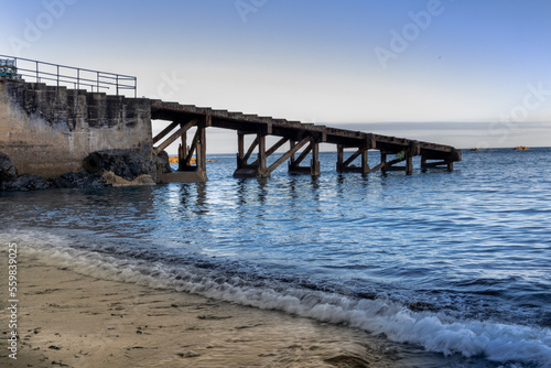pier on the beach, sea, ocean, blue water, old pier © Natalie