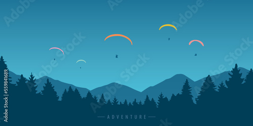 paragliding adventure group of colorful paraglider in blue sky in the mountains