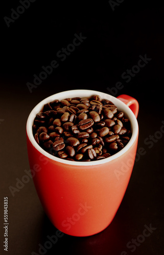 coffee beans in a cup on table