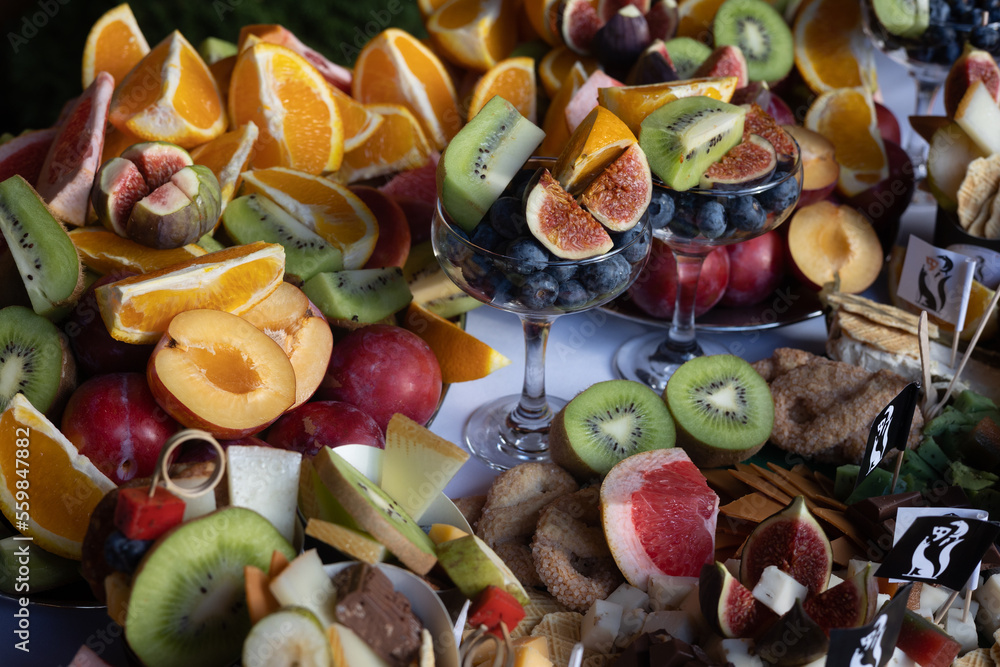 assorted fruits and cheese on the table assorted fruits and cheese on the table