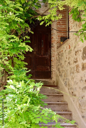 Fototapeta Naklejka Na Ścianę i Meble -  Entrance of an old house in the Montemerano, Grosseto, Tuscany, Italy. 