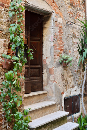 Entrance of an old house in the Montemerano, Grosseto, Tuscany, Italy. 