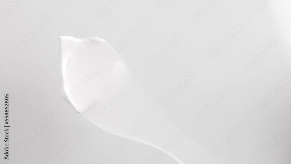 Heart shape made of cosmetic cream on gray background top view. Body care, lotion and moisturizing cream, beauty background. Heart shape made of cosmetic cream on gray background top view. Body care, lotion and moisturizing cream, beauty background.