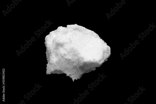 White snow isolated on black background close up