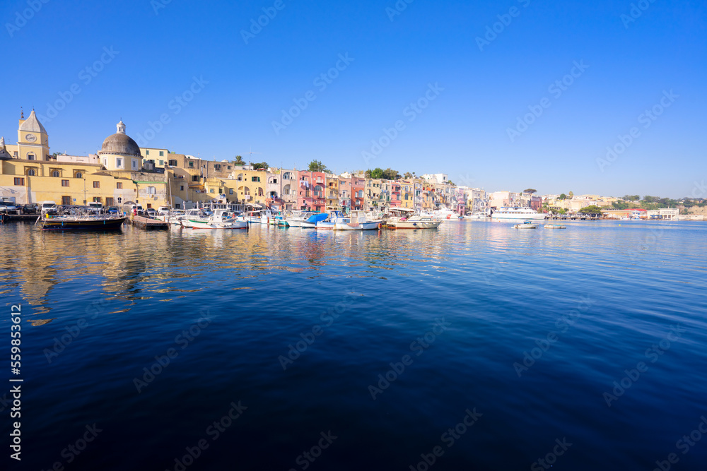 Marina Grande with colorful old houses of Procida island and Thyrenian sea, Italy
