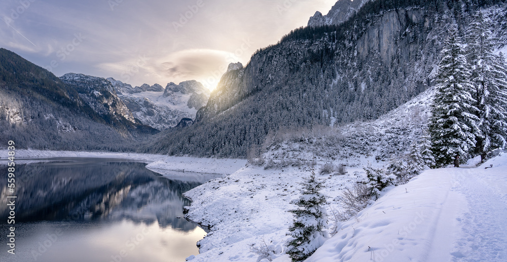 Beautiful snowy winter landscape with Dachstein mountain and Gosausee in Austria near Hallstatt