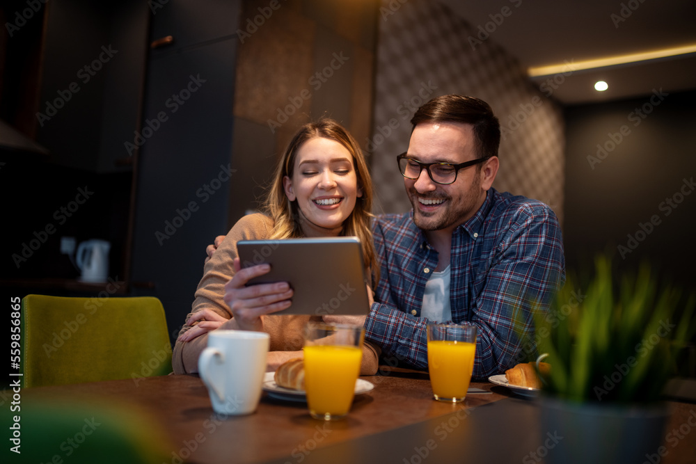Couple using tablet together Couple using tablet together