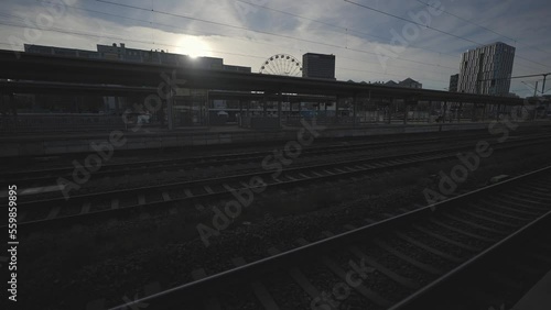 Munchen Ost or Ostbahnhof. Munich eastern railway station. Platfoms of railroad station Ost bahnhof. Munich East train station. Bahnhof Munchen Ost. Railroad and public transporation in Deutschland.  photo