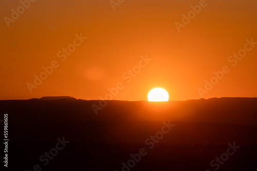 stunning cloudless colorful sunset above mountains in Namibia