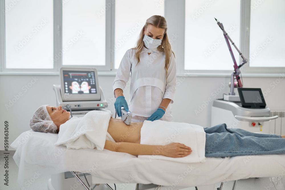 Obraz premium Laser epilation and cosmetology in beauty salon