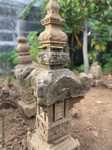 selective focus photo of lampulo ancient tombstone grave of aceh kingdom admiral