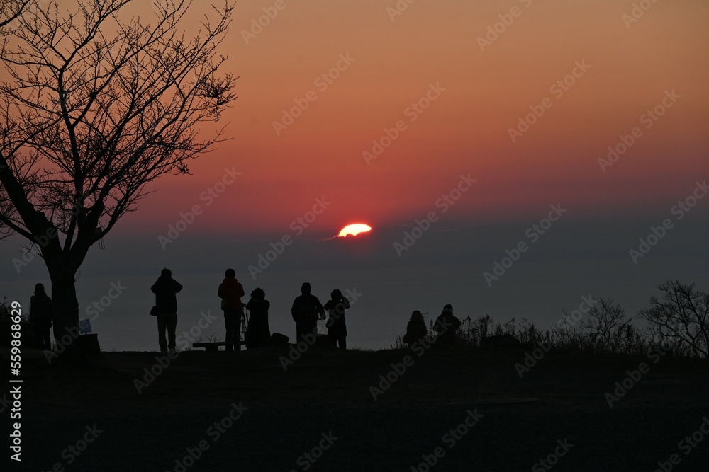 The first sunrise of the new year. Traditional cultural events for Japanese people who welcome the new year are going to a Shinto shrine for New Year's visit and watching the first sunrise of the year