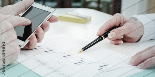 Business team working on stock charts, geometric pattern