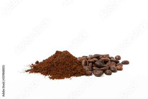 Ground coffee and coffee beans isolated on white background.