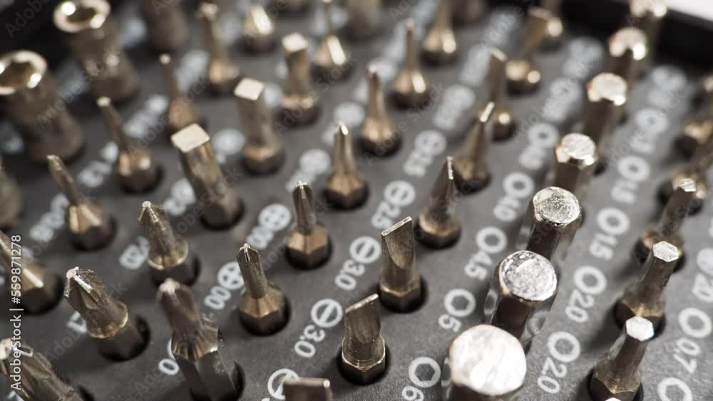Rotating Universal screwdriver set with different bits. Rotating Universal screwdriver set with different bits.