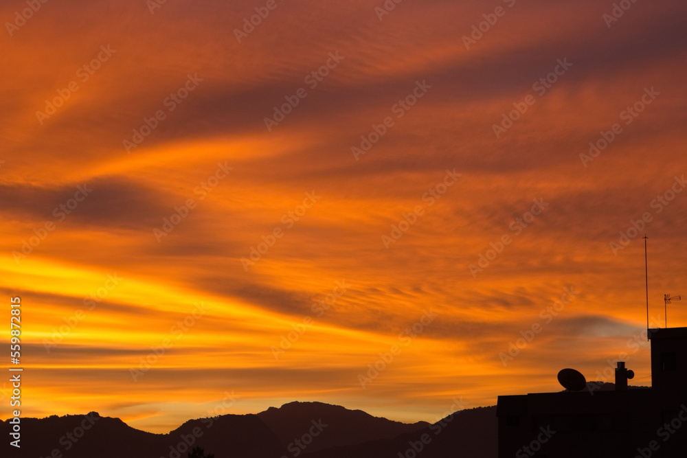 Spectacular and colorful sunrise on the horizon in Murcia	