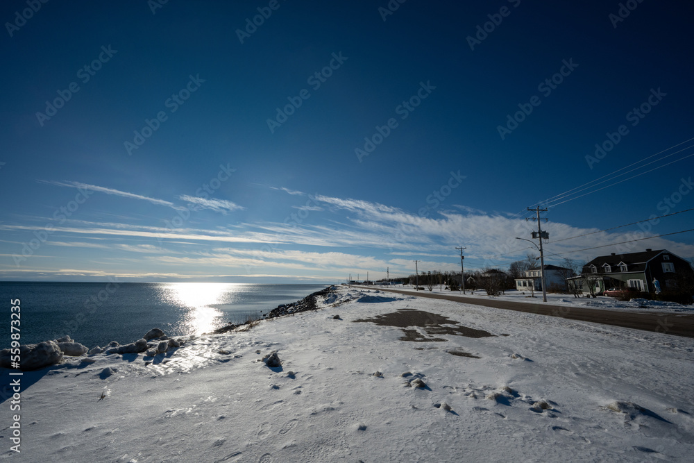 Village of Godbout in winter along the St. Lawrence River on the North Shore Village of Godbout in winter along the St. Lawrence River on the North Shore