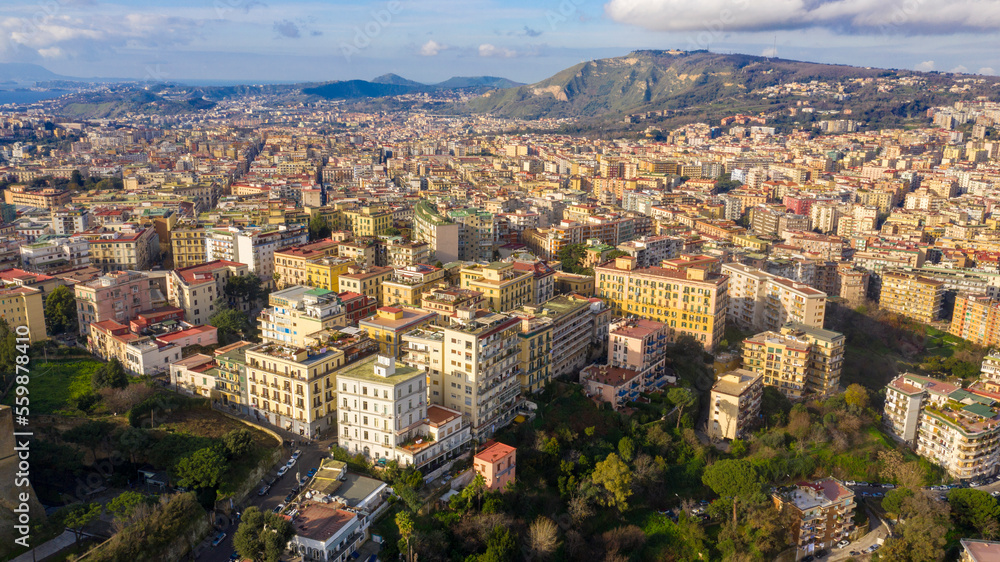 Fototapeta premium Aerial view of the hill and residential district of Vomero in Naples, Italy. Many are the buildings built in the narrow streets of the city.