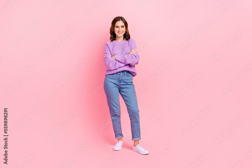 Full length photo of charming shiny lady wear violet sweater smiling arms crossed isolated pink color background Full length photo of charming shiny lady wear violet sweater smiling arms crossed isolated pink color background