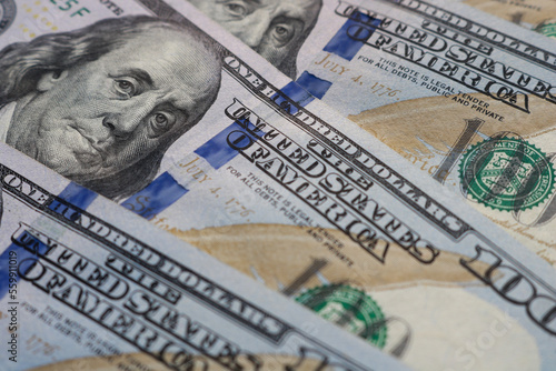 Closeup of hundred US American paper banknote currency. Global recession and inflation in the United States of America. Global financial crisis.