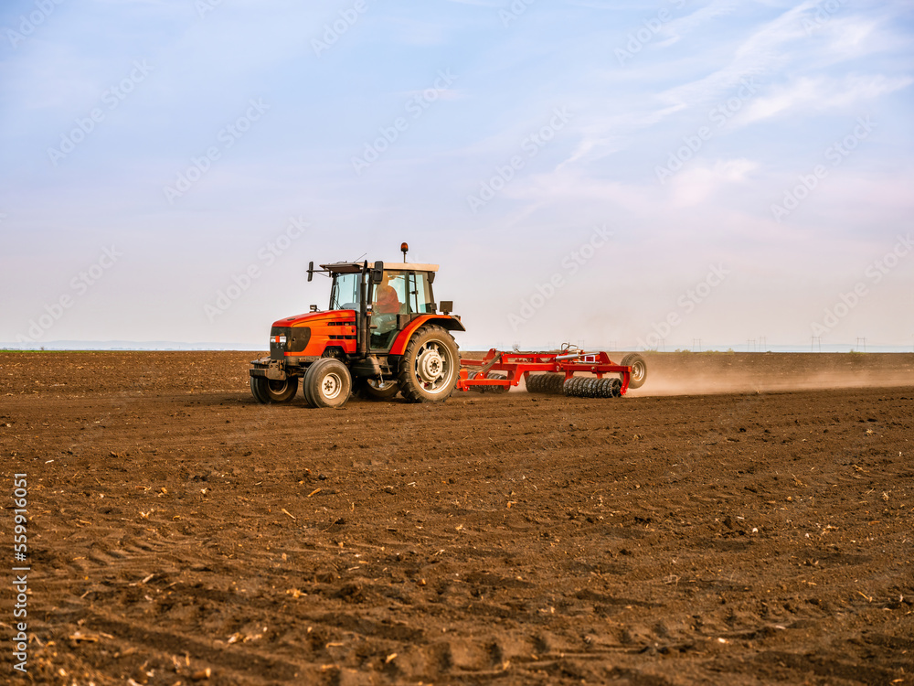 Nature's canvas, tractor preparing the earth for a new masterpiece Nature's canvas, tractor preparing the earth for a new masterpiece