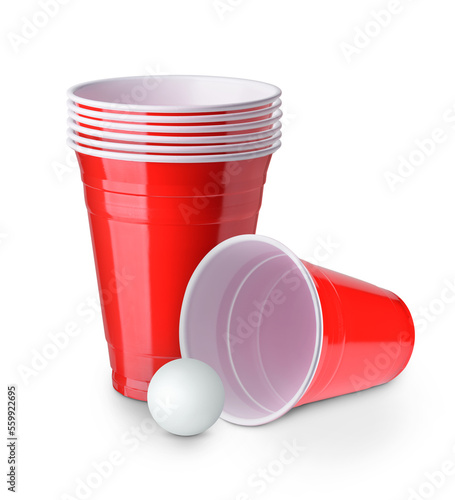 Beer pong. Red plastic cups and ping pong ball