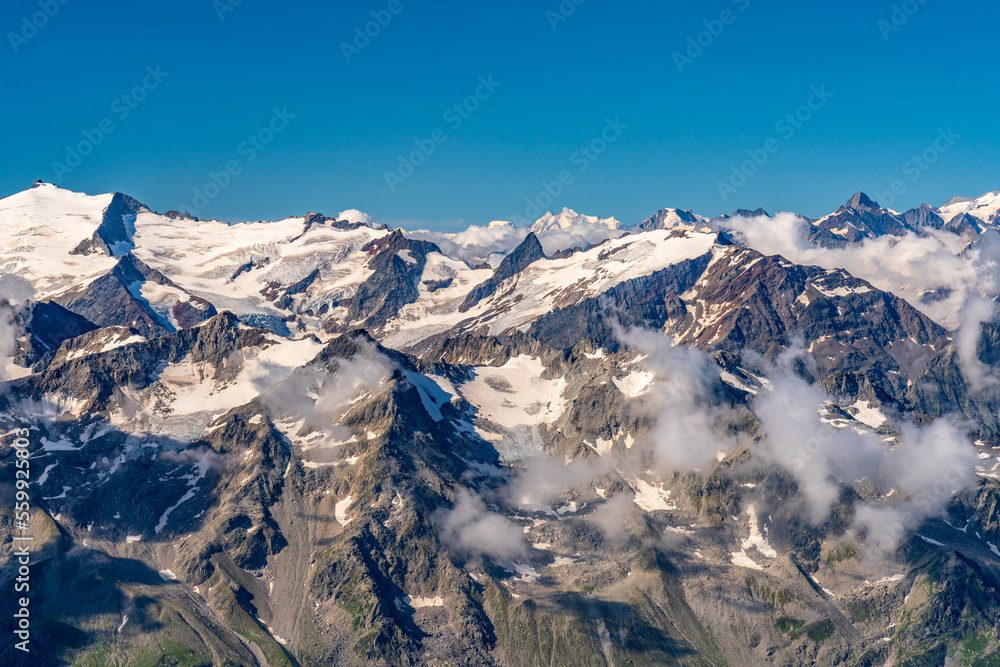 Fototapeta premium Switzerland 2022, Beautiful view of the Alps and Blue Sky around Titlis mountain.