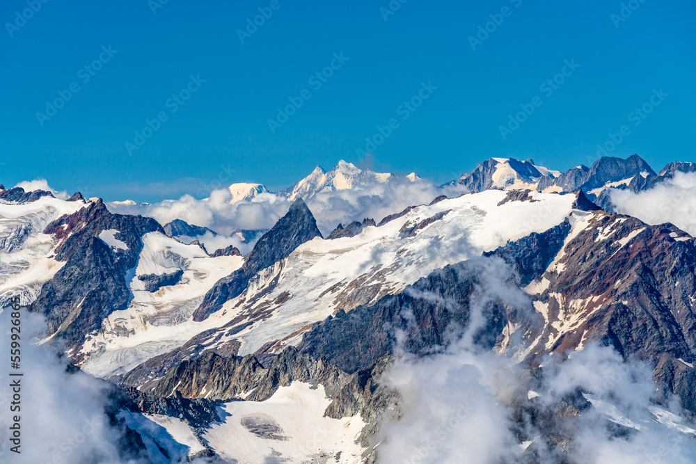 Switzerland 2022, Beautiful view of the Alps and Blue Sky around Titlis mountain. Switzerland 2022, Beautiful view of the Alps and Blue Sky around Titlis mountain.