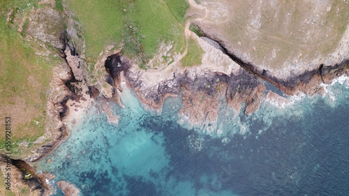 Bild auf Leinwand Aerial top down photo of Plemont beach