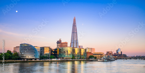 Photography Queens walk on the south bank of River Thames at sunset in London