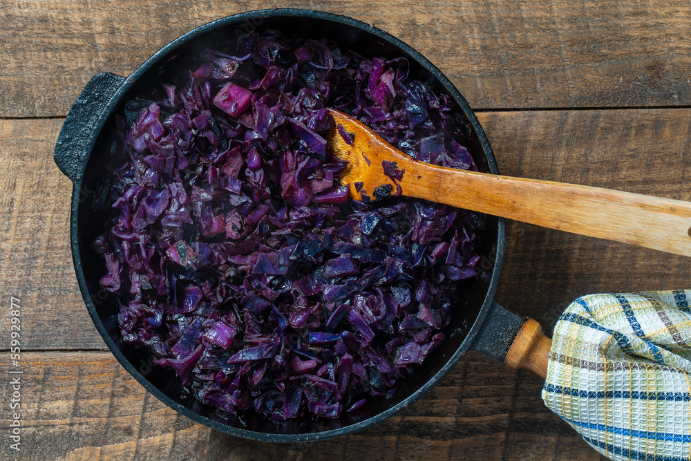 Red cabbage are panfried until lightly charred, then braised in mulled