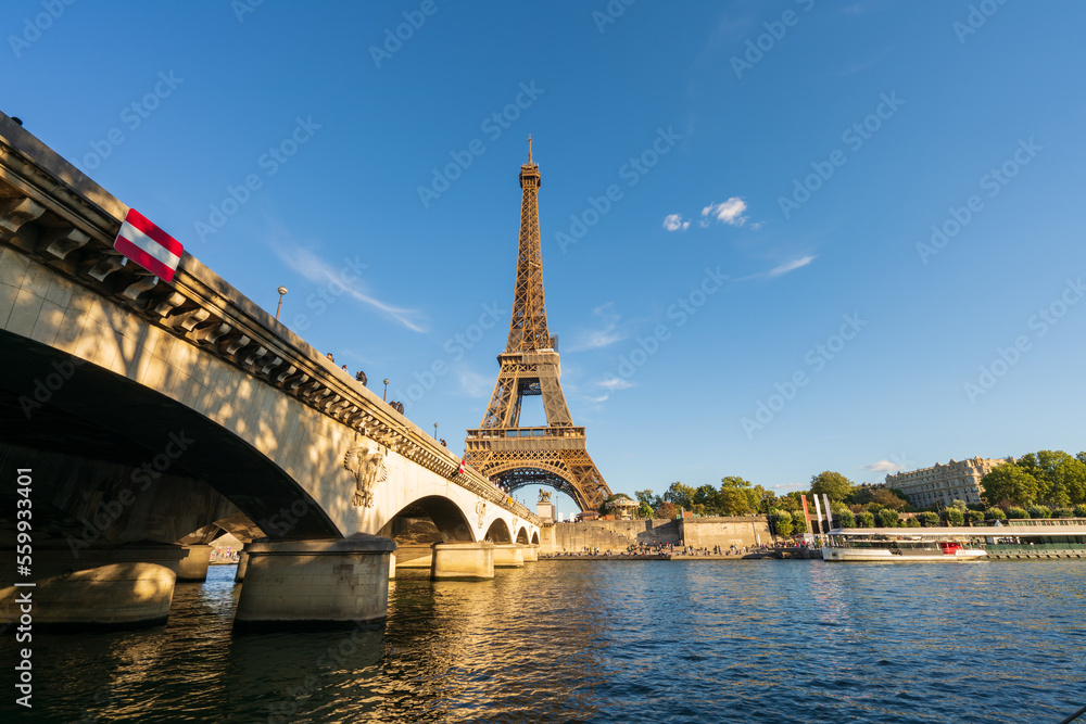Fototapeta premium Eiffel Tower by Seine river in Paris