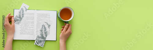 Female hands with book, cut...