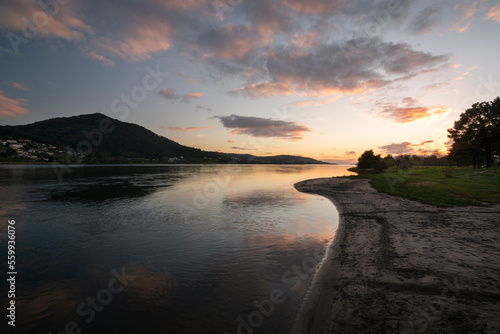 View of the miño river and the Eiras river beach at sunset in O Rosal photo