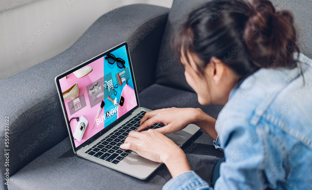Portrait of woman relax use technology of laptop computer for fashion online shopping.Young girl enjoy shopping time summer sale and buy something purchases at cafe.online shopping concept Portrait of woman relax use technology of laptop computer for fashion online shopping.Young girl enjoy shopping time summer sale and buy something purchases at cafe.online shopping concept